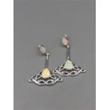 A pair of silver and opal Art Deco style drop earrings