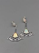 A pair of silver and opal Art Deco style drop earrings