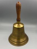 A large brass school bell