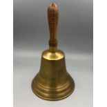 A large brass school bell