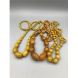 Three Amber style necklaces