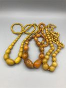 Three Amber style necklaces