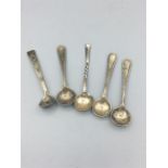 A selection of silver mustard spoons