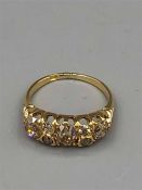 An 18ct Yellow Gold seven stone Diamond ring 1.6cts