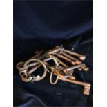 Three sets of cast iron keys