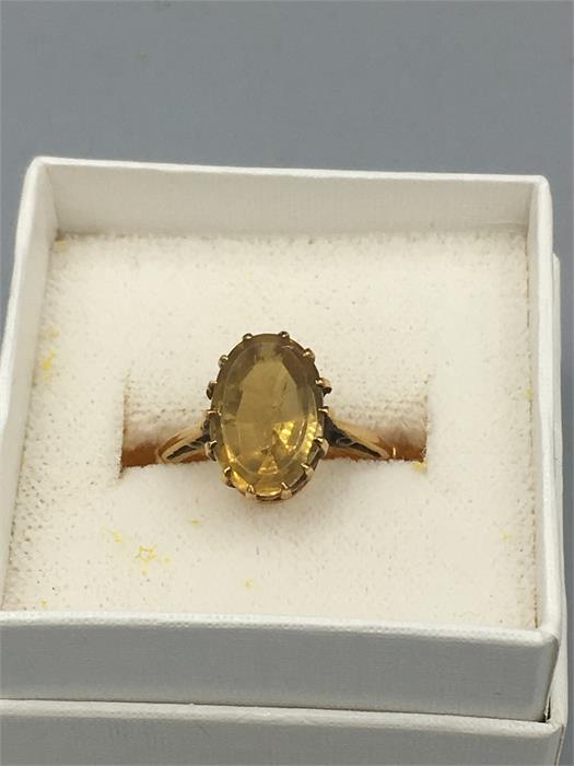 A Citrine ring in an 18ct gold setting