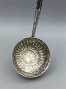 A White metal ladle