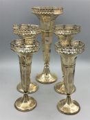 A Set of five silver graduated vases, hallmarked Birmingham 1915, makers mark HM, Henry Matthews.