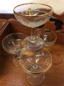 Four Babycham glasses