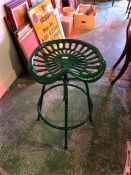 A Green tractor seat stool
