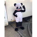 A full size Panda suit. He does have a tear to his rear end but easily sewn up.