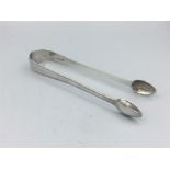 Sugar Tongs, hallmarked silver, possibly 1830, makers mark KCGS