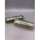 Two hallmarked silver topped brushes