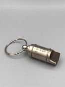 A Steel cased whistle stamped Titanic