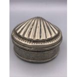 An Indian white metal box with a shell motif