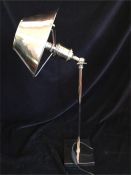 A chrome Desk Lamp
