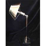 A chrome Desk Lamp