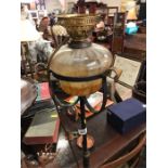 A Wrought Iron oil lamp, converted...