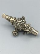 A silver Babies rattle CS*FS hallmarked Birmingham (AF) possibly 1888