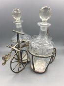 A silver plated Bicycle decanter set in the form of a c1870 solid tyred velocipede tricycle, liqueur