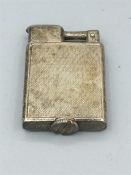 A silver lighter hallmarked 925, dated 9.6.28