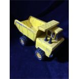 A Matchbox yellow tipper truck