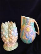 A Beswick Pineapple vase and a jug (Jug has slight chip to underside of handle)