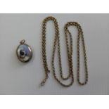 A 9ct gold chain 26.44 g and a gold plated locket (2)