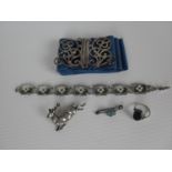 A Birmingham silver nurse's belt, silver and enamel bracelet, silver brooch (x2) and silver ring (5)