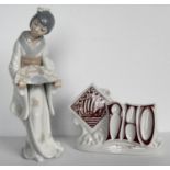 A Nao figure of a young Japanese lady holding a fan and a Nao advertising tablet (2)