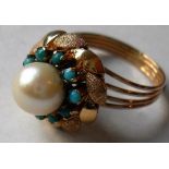 An Art Deco cultured pearl and turquoise fancy cluster ring on 18ct yellow gold. The centre round