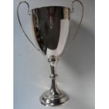 A large two-handled silver trophy cup on knopped stem and circular stepped foot by A&D Limited,