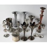 An assorted lot of silver plated candle holders and vases, to include four pairs