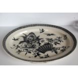 A G&K ironstone 18-inch platter with transfer decoration of birds, foliage, etc, reg. no. 9269 to