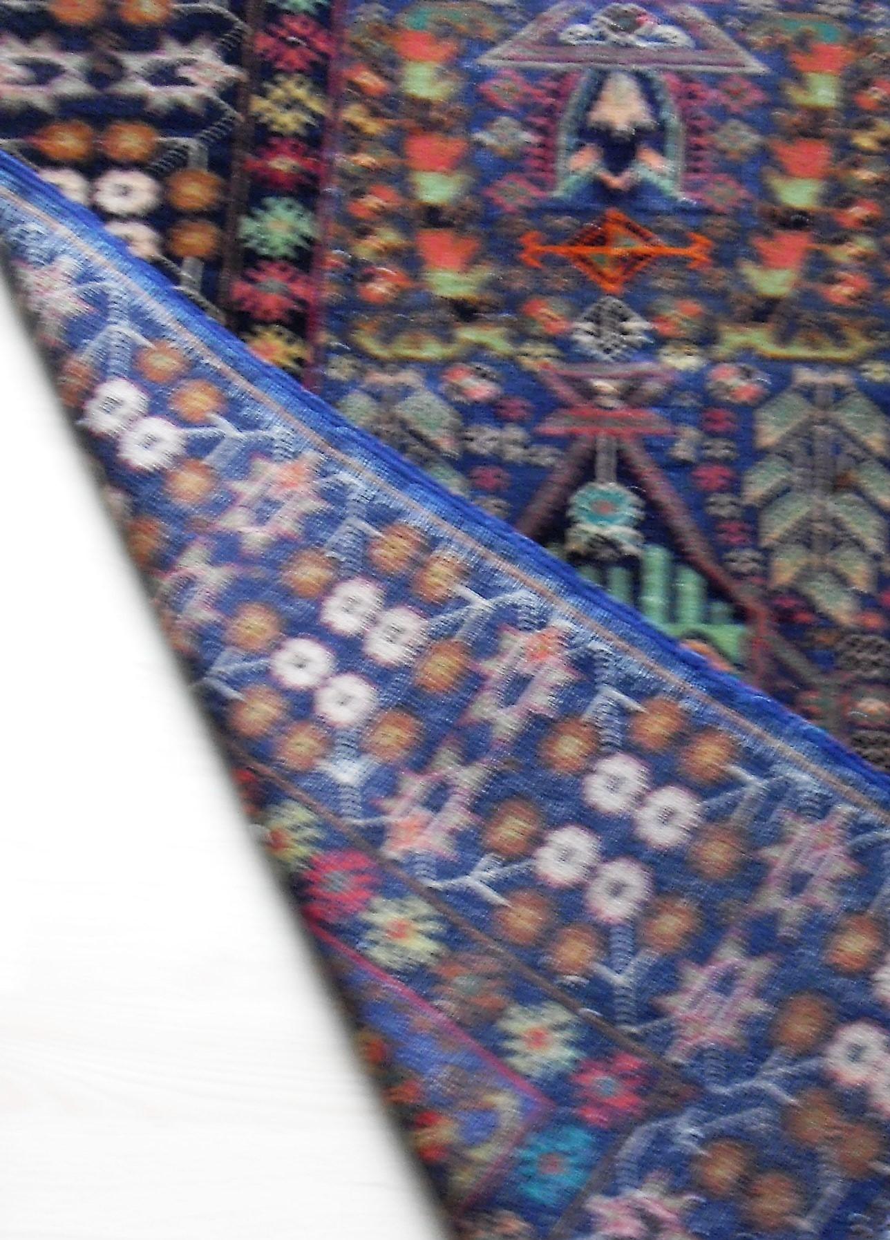 An Afghan hand-knotted blue-ground Balochi wool rug with multi-coloured isometric designs and - Bild 2 aus 2