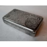 A 19th century Russian silver snuff box with c-scroll and floral etched niello decoration, stamped