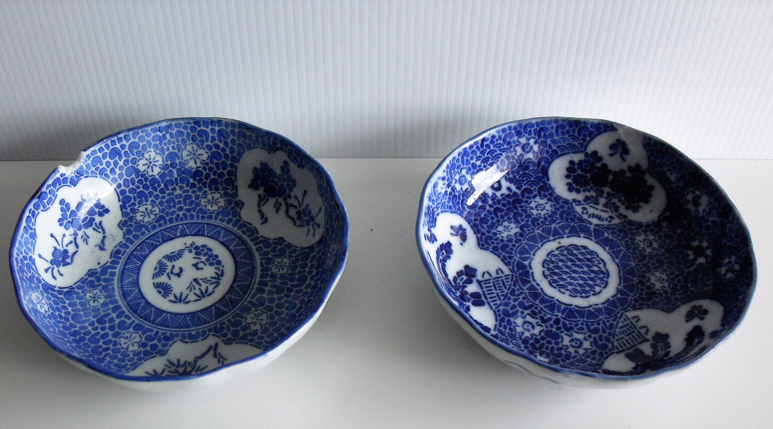 Two circular Oriental 19th century blue / white plates