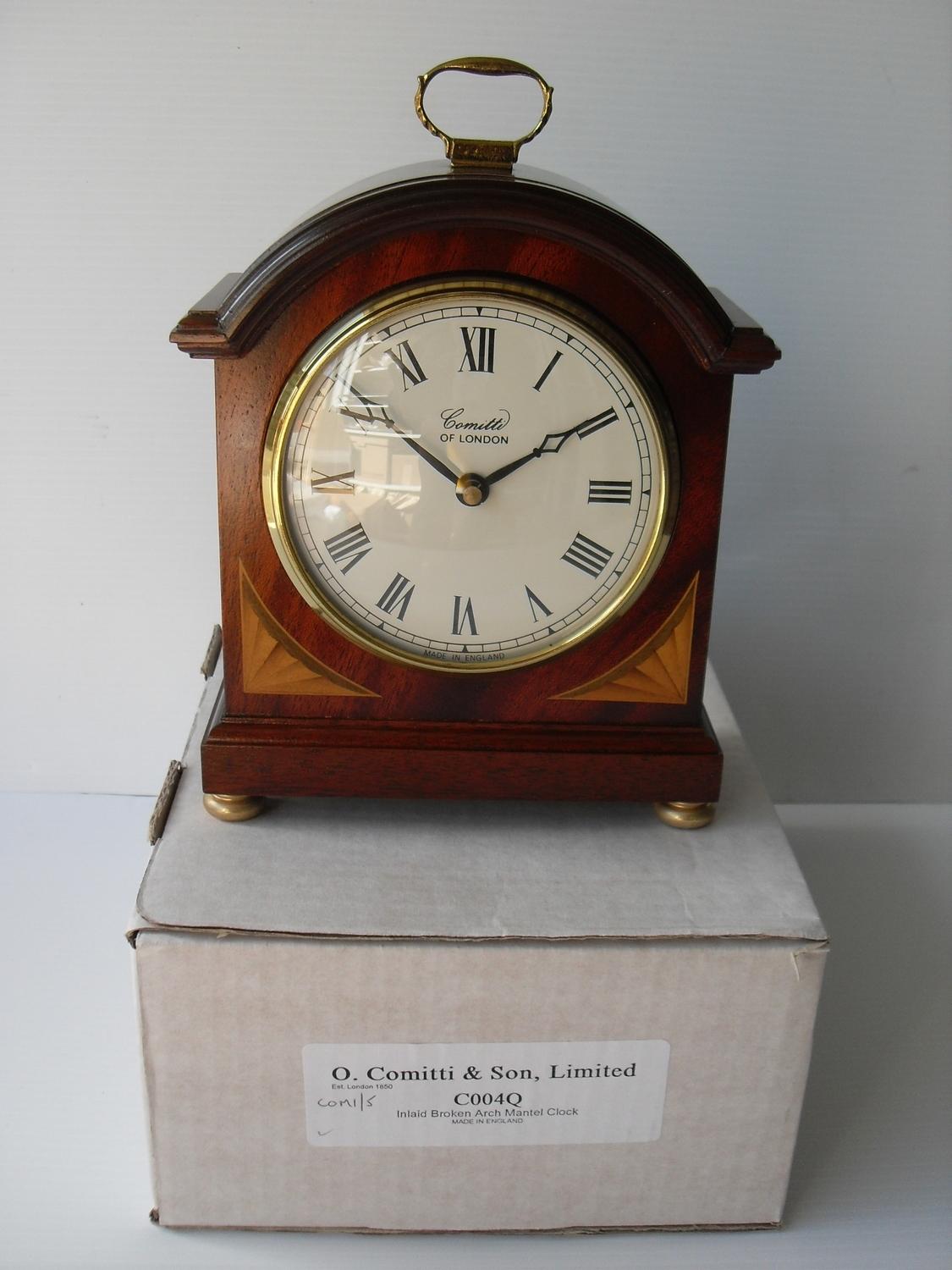 O. Comitti & Son, an Edwardian-style inlaid, broken arch mantle clock, boxed, as new