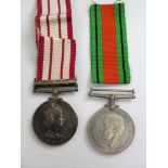 A Naval General Service Medal (Clasp - Near East) named to P/MX 908212 E. J. TILBURY A/L R.E.M. R.N.
