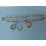 A Tiffany heart-shape pendant chain, 48 cm, 2.4oz, a silver seven-stone goshenite ring, size N and a