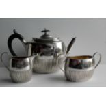 A Victorian silver tea set by William Hutton, London 1891, 23oz