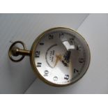 A brass cased Superior Motor Timekeeper Lever Swiss-made, the white dial with black Arabic numerals,