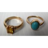 A 9ct yellow gold turquoise cabochon ring, and a baguette-cut citrine single stone ring, both size
