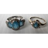 Two 9ct white gold aqua marine dress rings, both size N, hallmarked, 6.35g