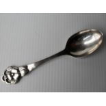 A Danish Arts & Crafts silver spoon by Christian F. Heise, 1927 with hammered hand-crafted floral