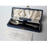 A George V cased silver jubilee spoon, Sheffield 1934 with certificate by Mappin & Webb, dated 1935