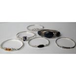 Six silver bracelets set with various coloured stones (6)