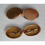 A pair of Edwardian 15ct yellow gold oval cufflinks in original presentation box, 6.84g