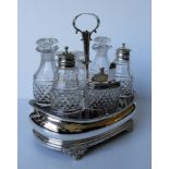 A George III silver and crystal navette-shape cruet set with seven matching bottles, the salt,