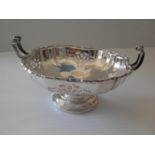 A 1960s silver two-handled tazza or bon-bon dish with pierced decoration on a single spreading